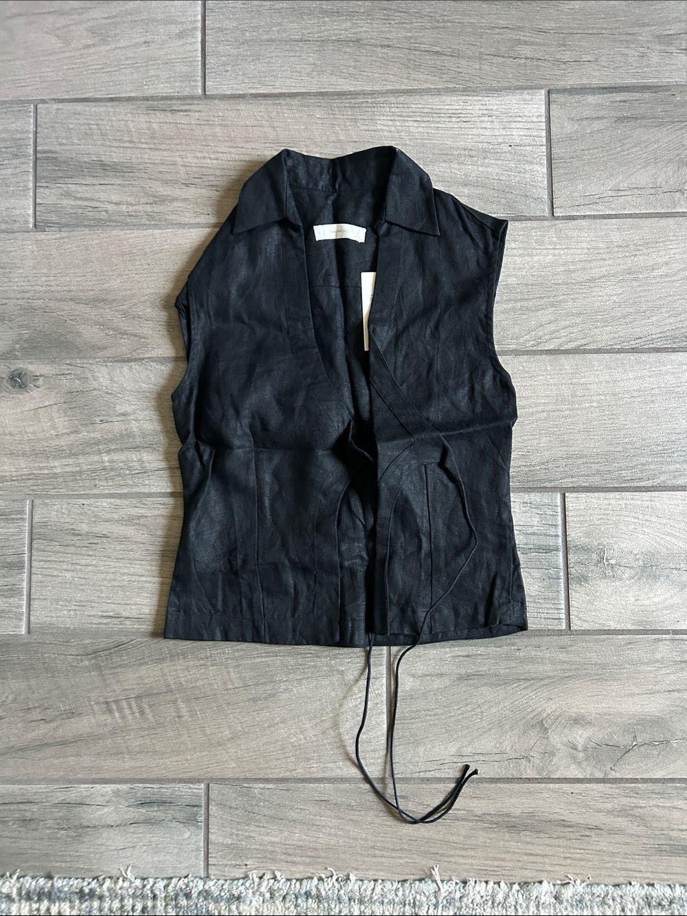 Faithfull the Brand Antibes sleeveless wrap shirt in black